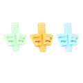 Set of three triangular pencil grips: mint green, orange, and light blue