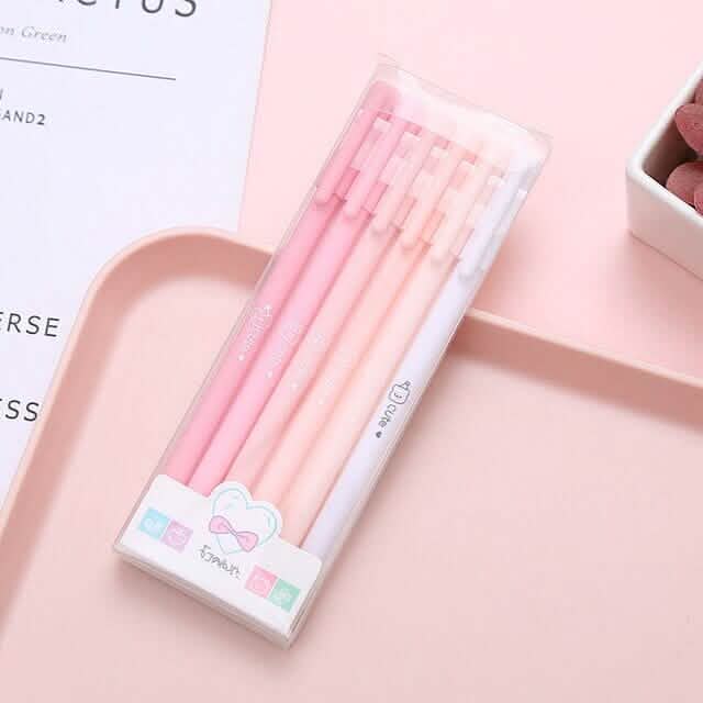 4-pack pink pastel gel pens in clear case with heart decals and small pattern icons