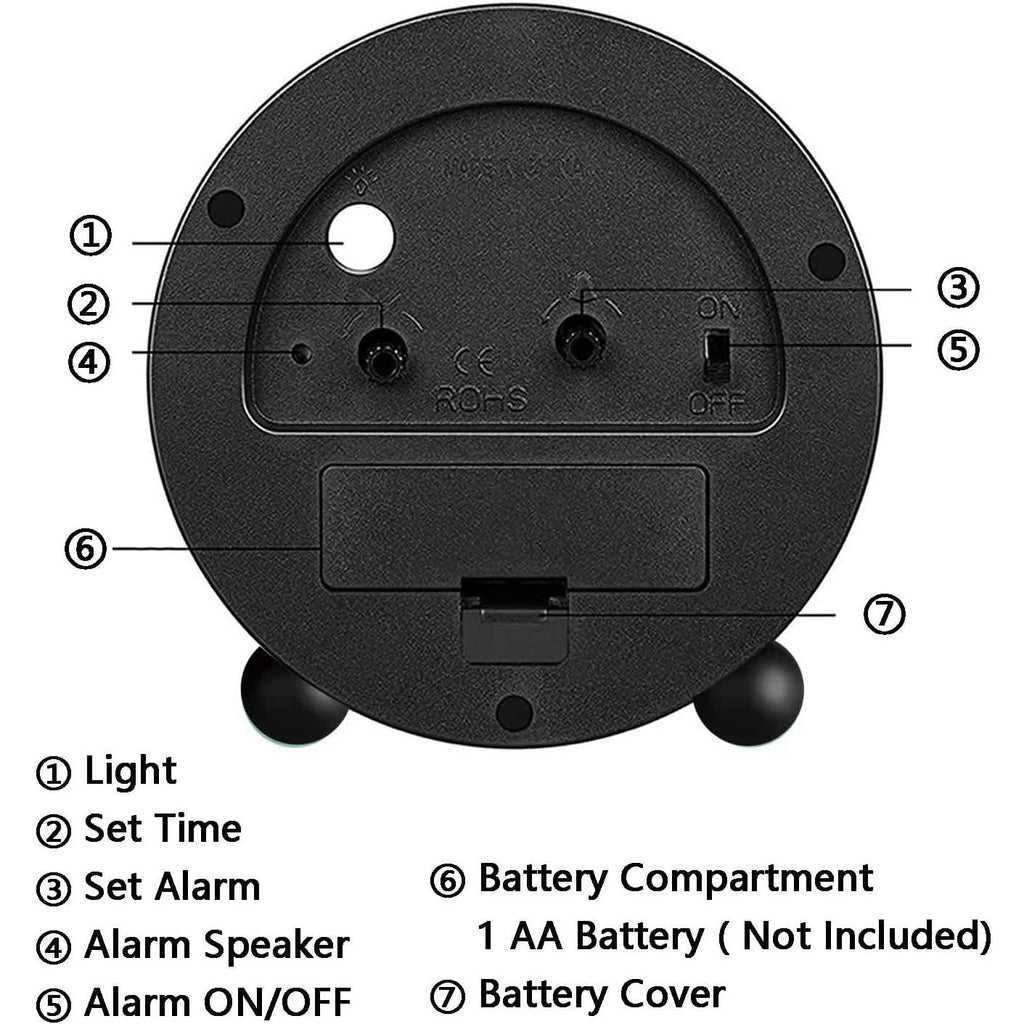 Black analog alarm clock rear view with battery compartment and light button