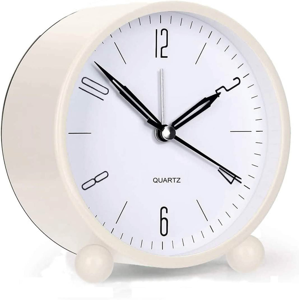 White analog alarm clock with black hands and twin bells on front stand