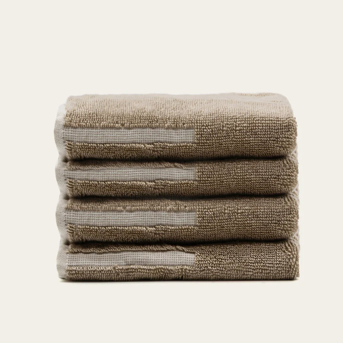 Australian cotton washcloths, folded stack in tan and ecru