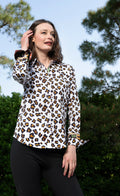 Oversized long-sleeve button-up shirt with multicolor dotted leopard print
