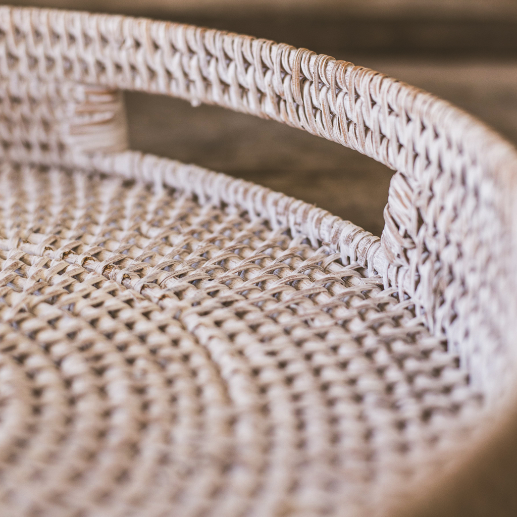 Close-up of tray rim and woven texture with white rattan strands
