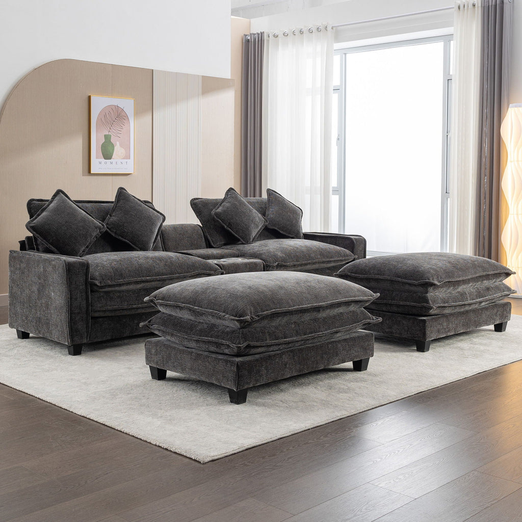 Dark gray sectional sofa with removable ottomans and stacked seat cushions, throw pillows
