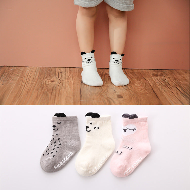 Set of kids cotton baby socks: gray, white, and pink with panda faces and animal prints.