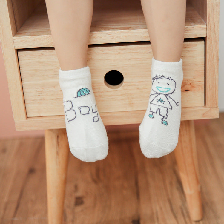 White kids cotton baby socks with colorful boy and robot character embroidery.