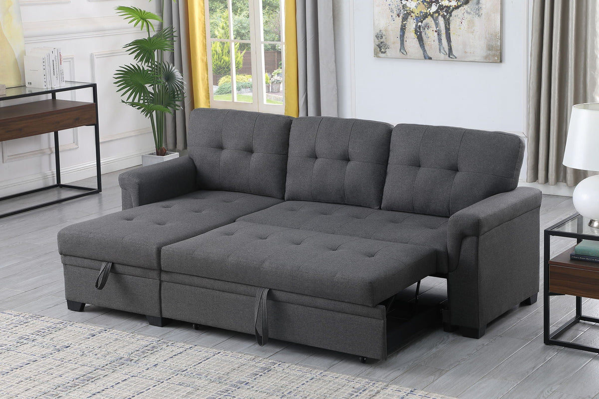 Dark gray sectional sofa with storage chaise, tufted back and plush seat cushions.