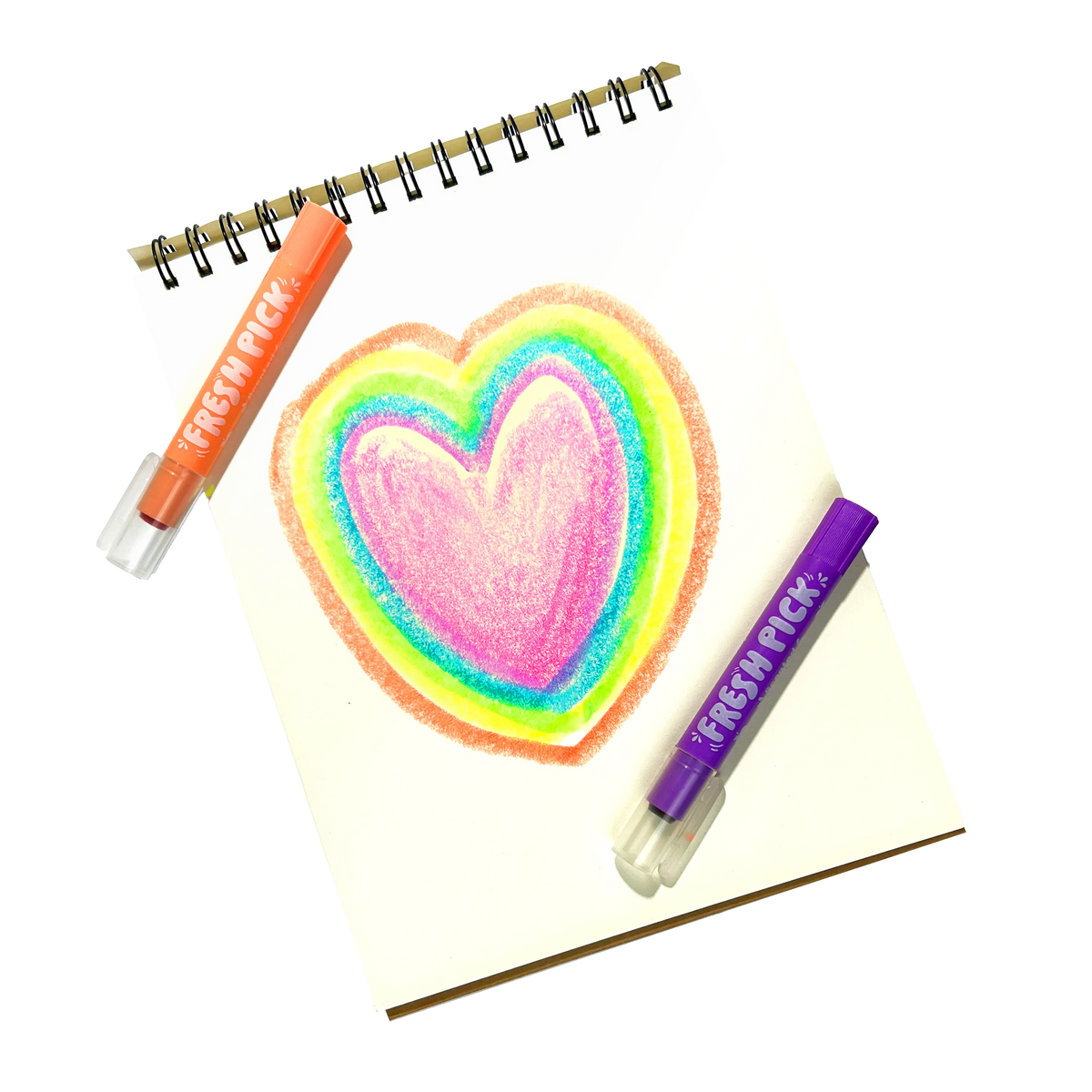 Neon gel crayons with orange and purple barrels beside a glittery rainbow heart