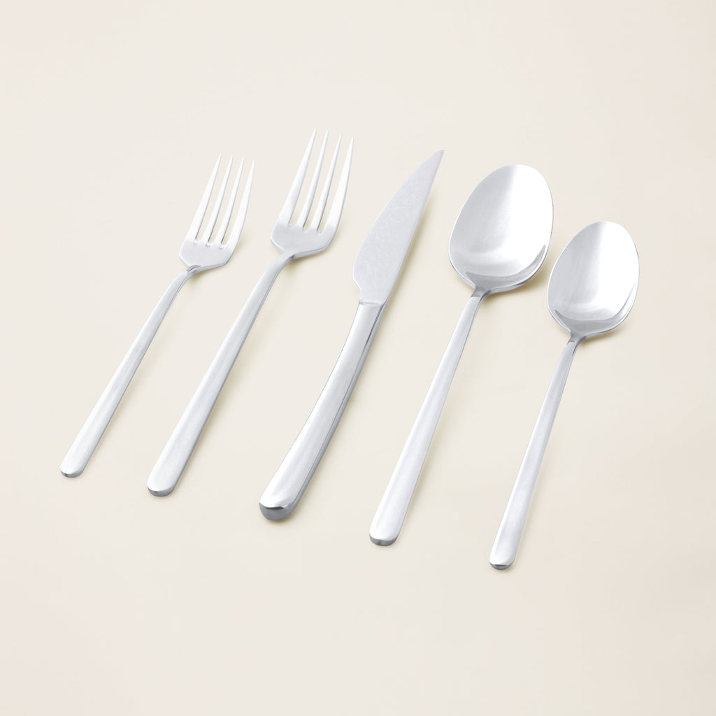 Silver mirror-finish 20-piece flatware set with forks, knives, and spoons