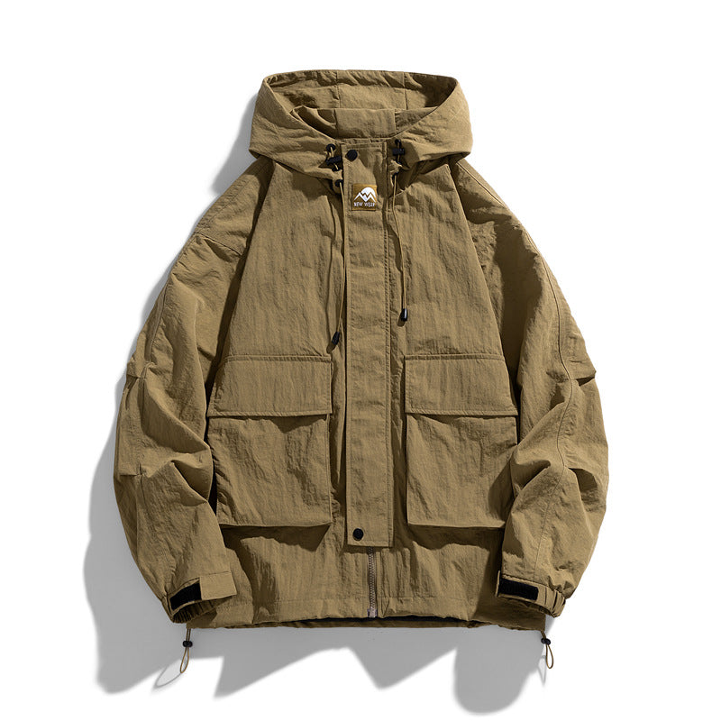 Tan hooded zip-up work jacket with front pockets and adjustable drawstring hood