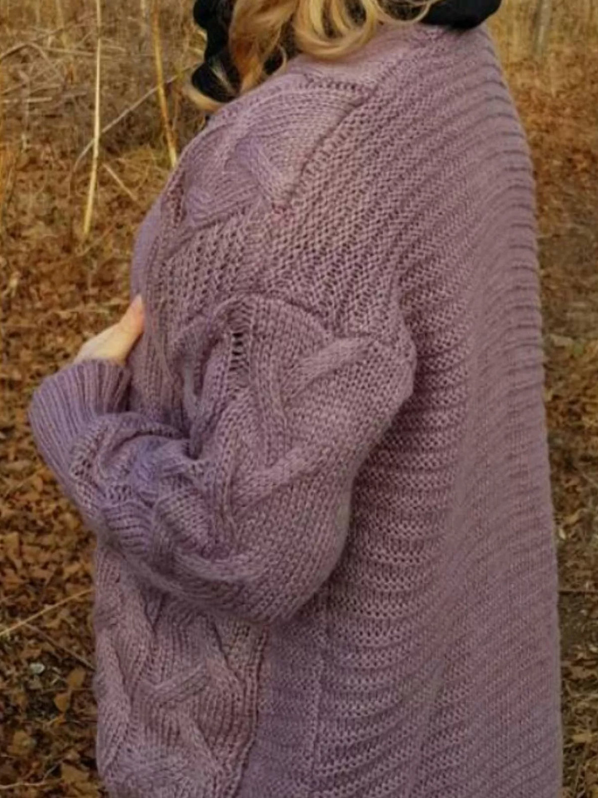 Lilac-purple cardigan back view with cable-knit pattern and ribbed cuffs