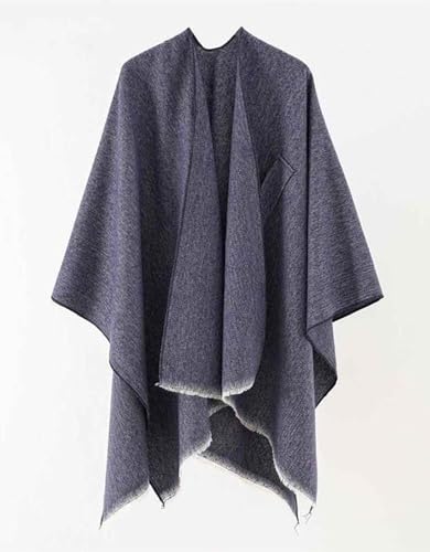 Women’s open-front fringe poncho shawl in slate blue-grey, draped cape style with uneven hem.