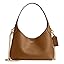 Hobo bag in honey brown with chain shoulder strap and small exterior tag