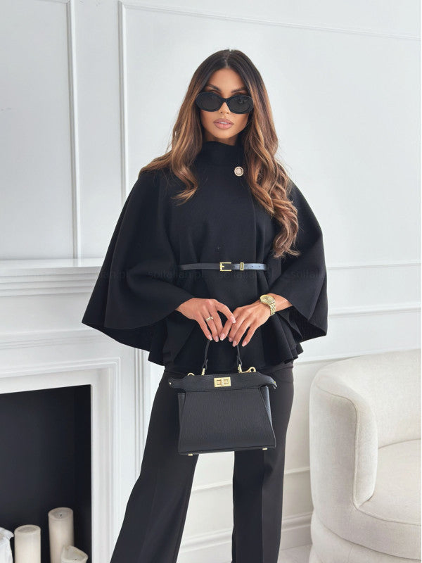 Women’s black cloak top with stand collar, batwing sleeves, and waist belt