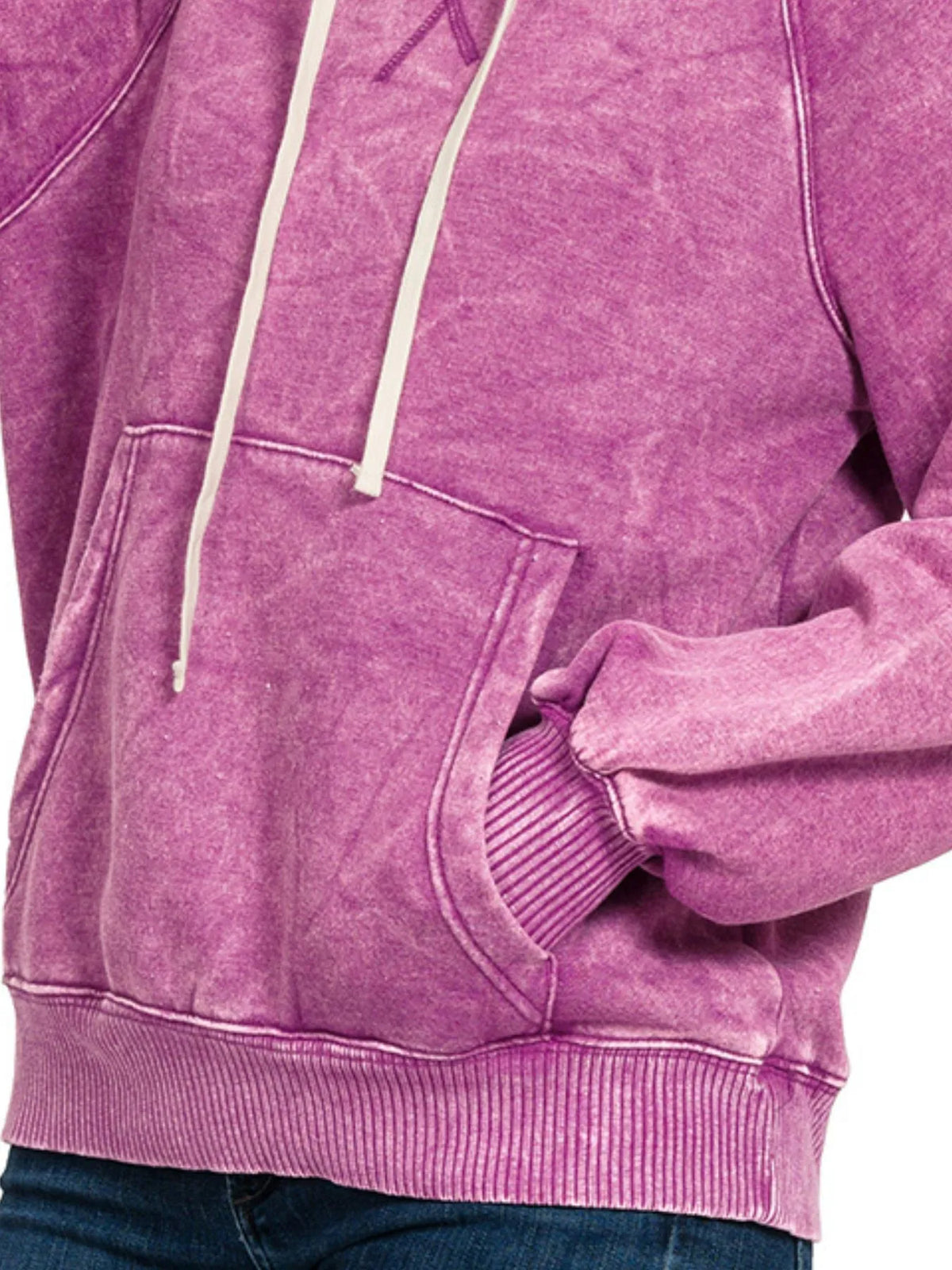 Light plum acid-wash hoodie front close-up: kangaroo pocket and drawstring hood