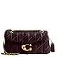 Quilted shoulder bag in deep plum with chain strap, front flap, and turn-lock clasp.
