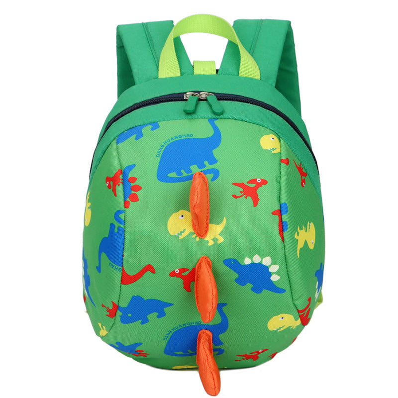 Green kids dinosaur print backpack with front zipper and dangling orange charm tags