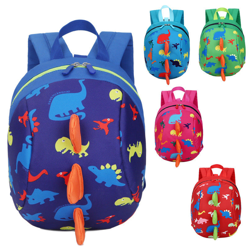 Light blue kids backpack with colorful dinosaur print, front zipper and hanging dino charms