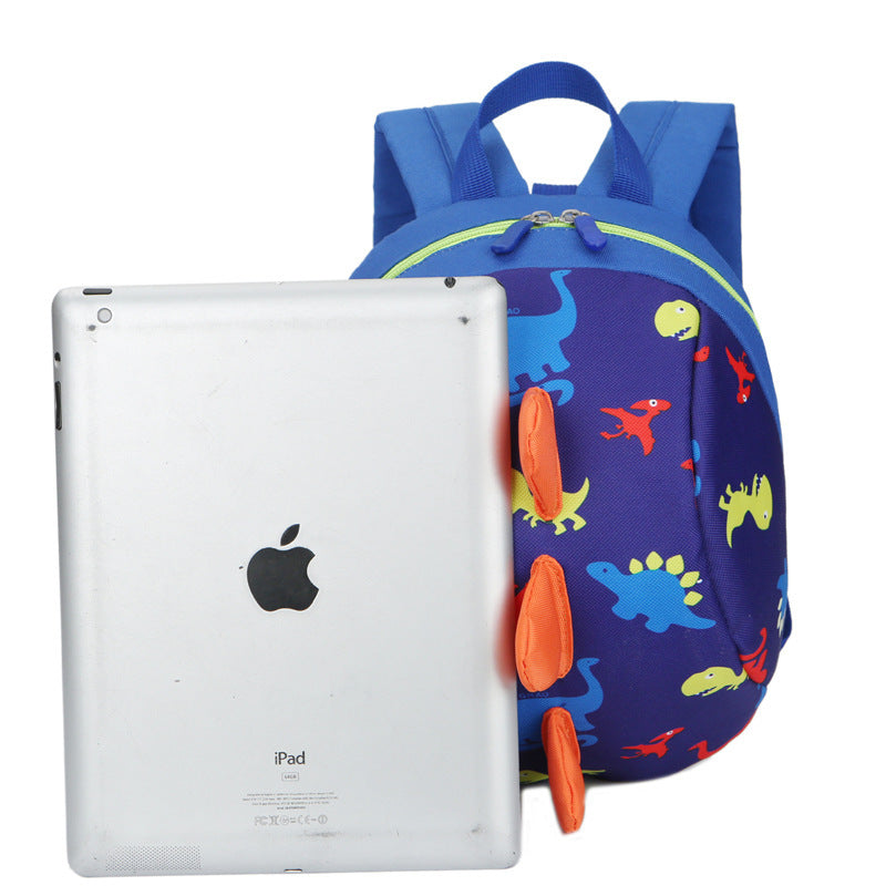 Navy dinosaur print kids backpack with front pocket straps; fits an iPad