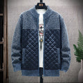 Blue plush sweater jacket with quilted front panels and full zip, ribbed cuffs