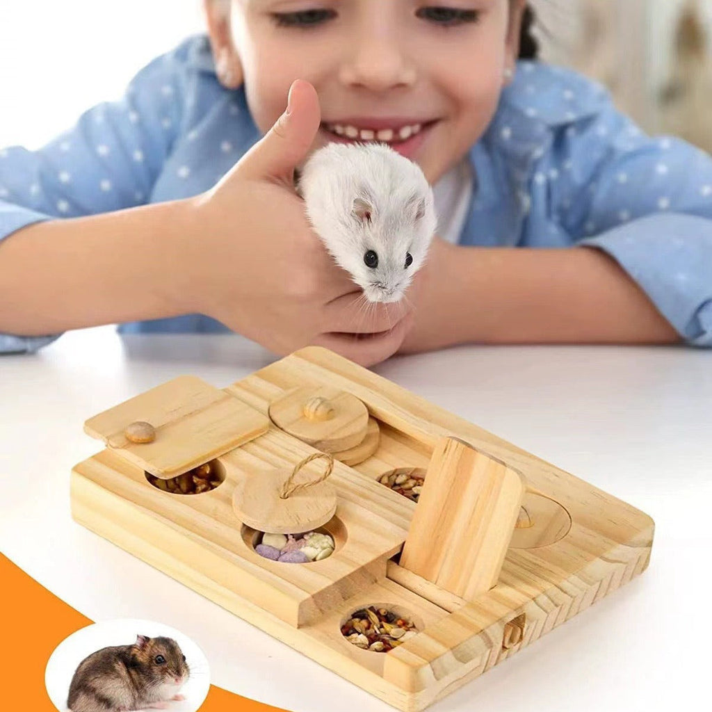 Wooden hamster snack feeder toy with circular treat wells and a sliding opening