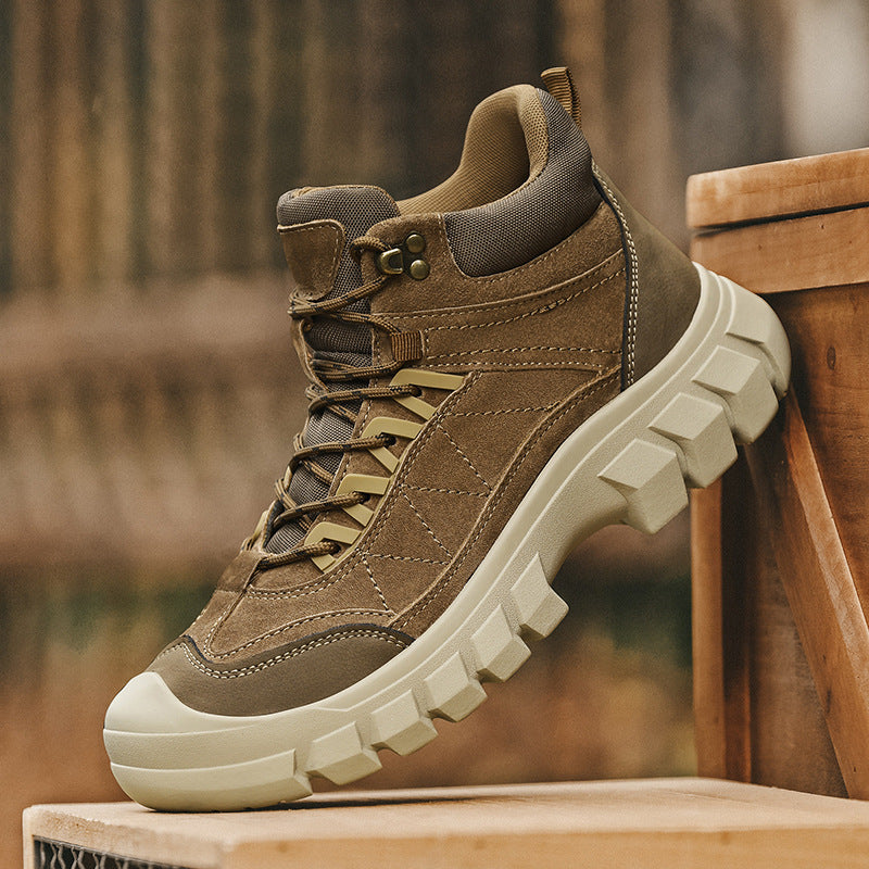 Khaki high-top hiking boot with lace-up closure and thick white lug sole