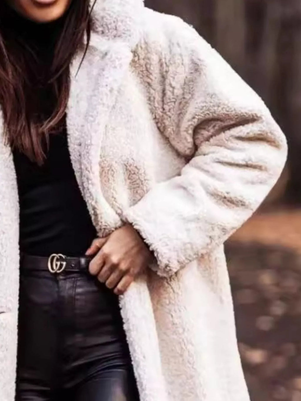 Cream hooded teddy longline coat with long sleeves and soft plush texture.