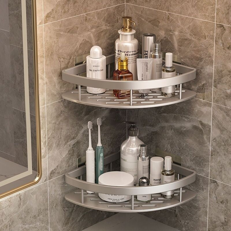 Anti-rust metal corner shower rack with two shelves holding toiletries