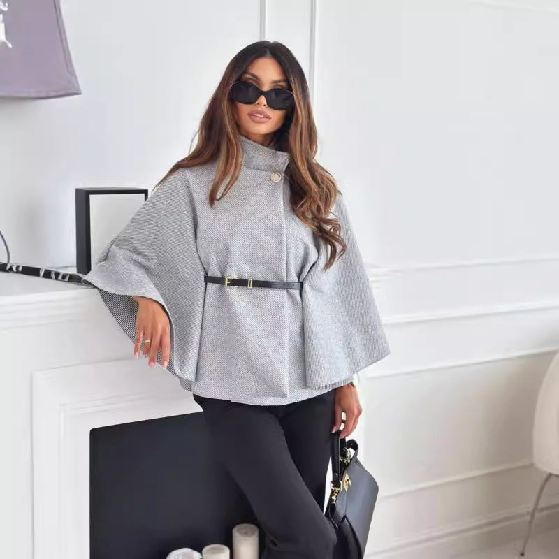 Women’s gray cloak top with stand collar, batwing sleeves, and waist belt