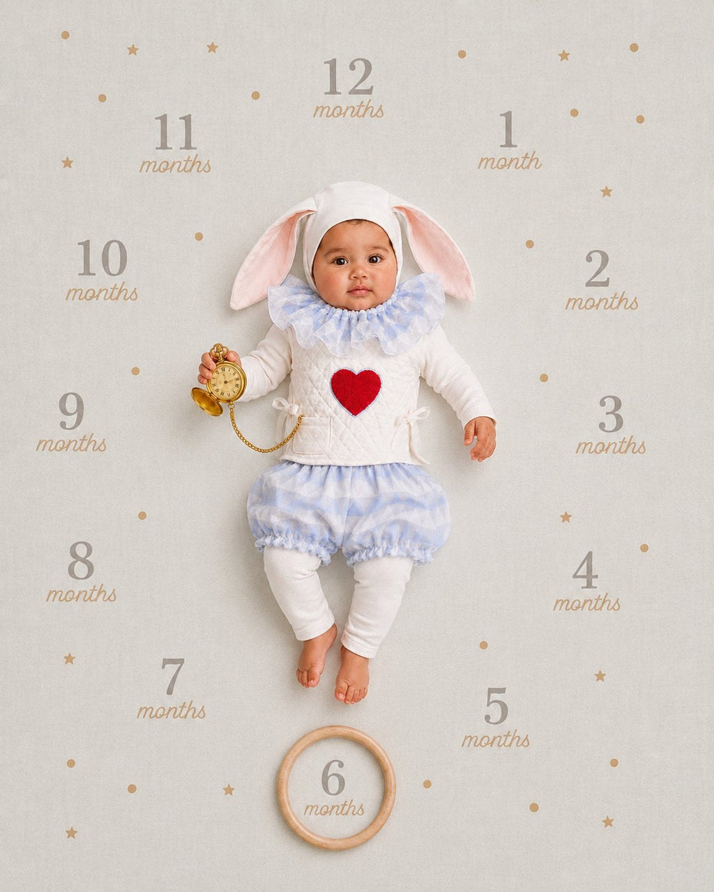 White rabbit-style baby costume: hood with bunny ears, red heart front, light blue ruffled skirt