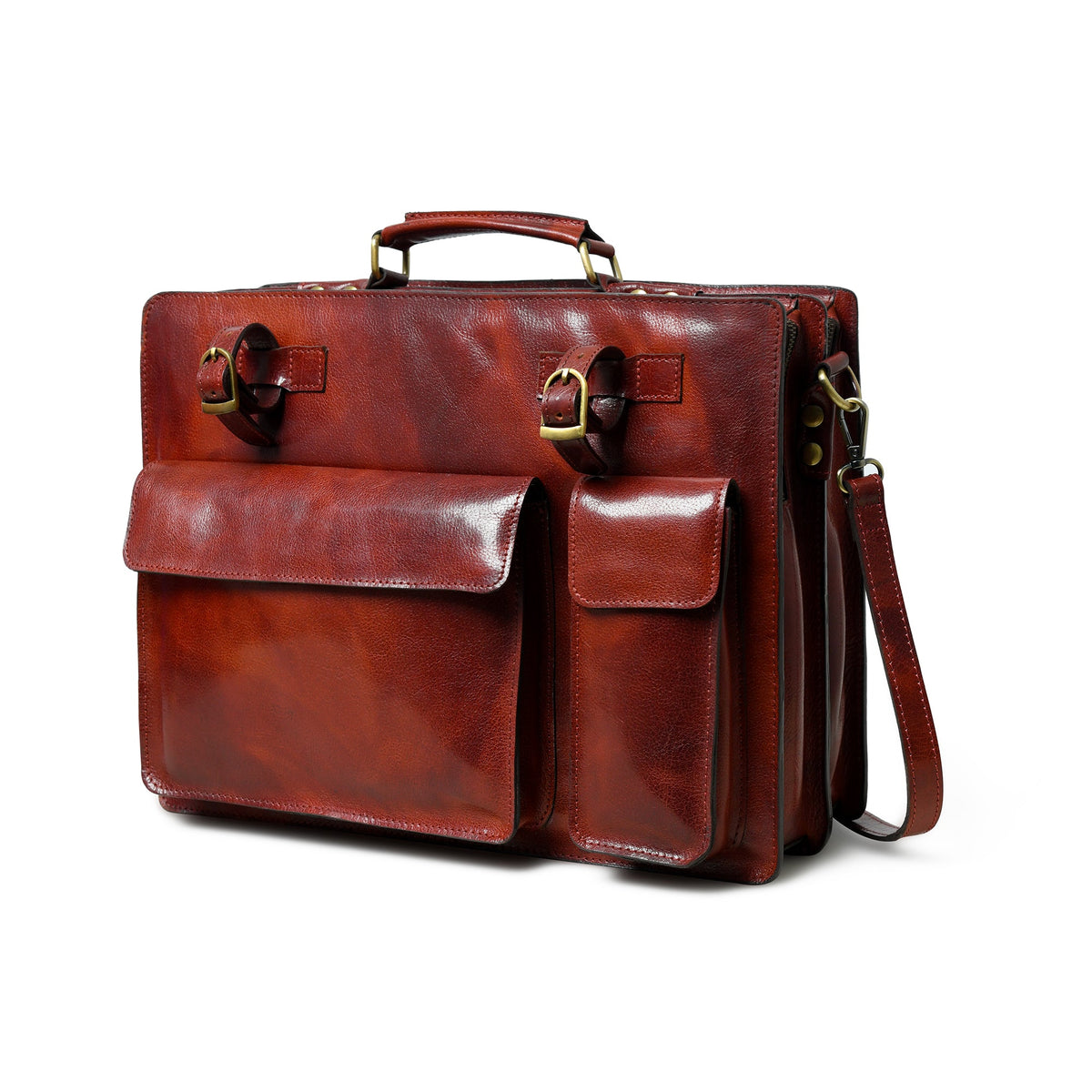 Tan leather briefcase with top handle, front flap, and two buckle-lock pockets.