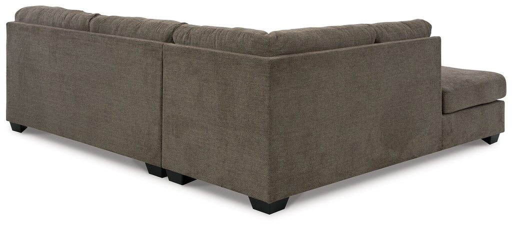 Dark brown sectional sofa with corner chaise, tufted back, and squared arms