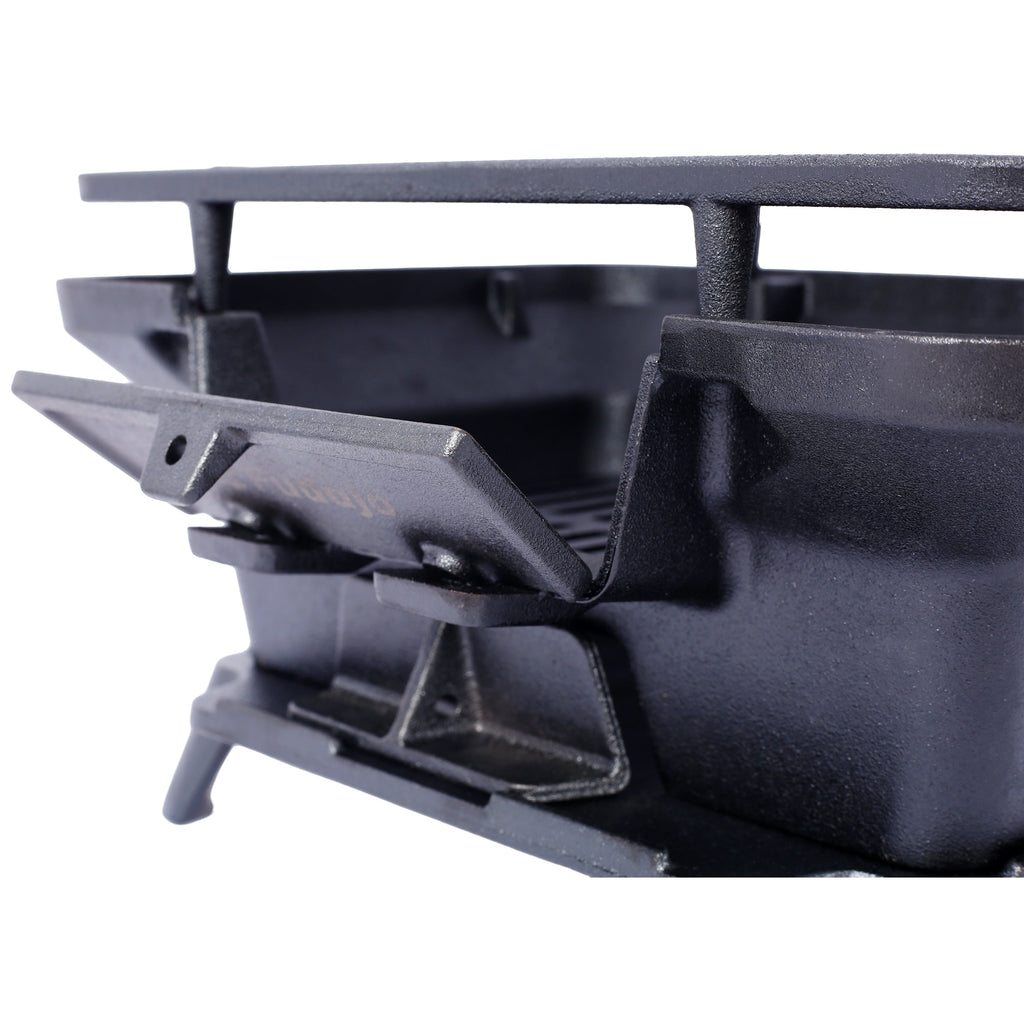 Charcoal oval cast iron tabletop grill with folding support and latch, Fudajo