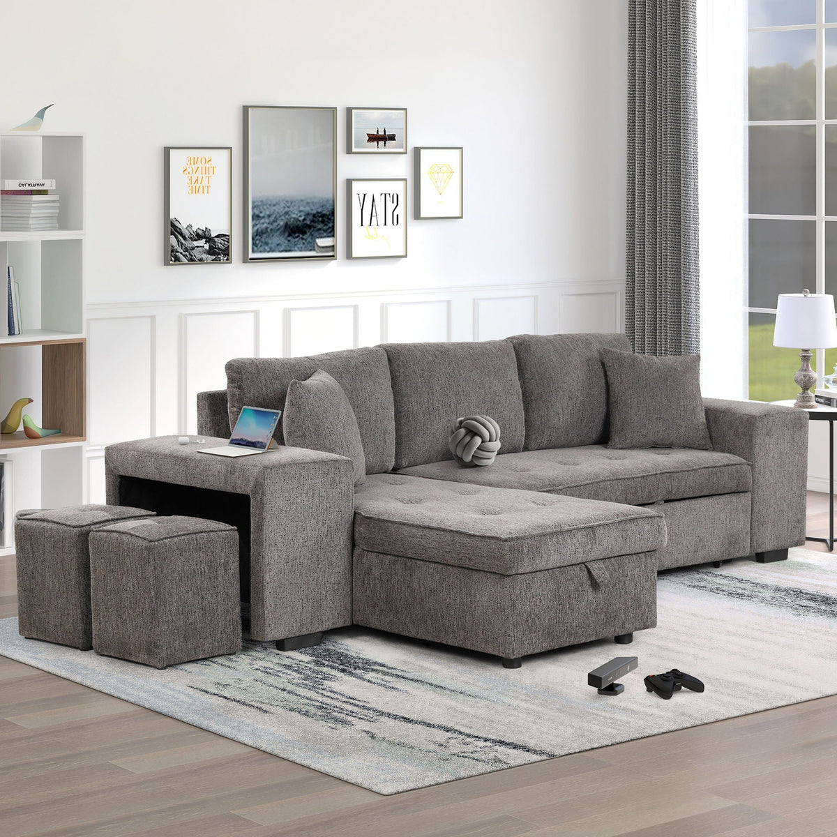 Dark gray L-shape reversible sleeper sectional sofa with pull-out bed and storage chaise