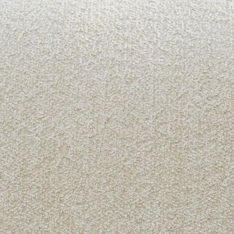 Beige textured cushion fabric close-up