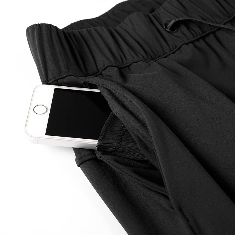 Black drawstring waistband with elastic and pocket detail