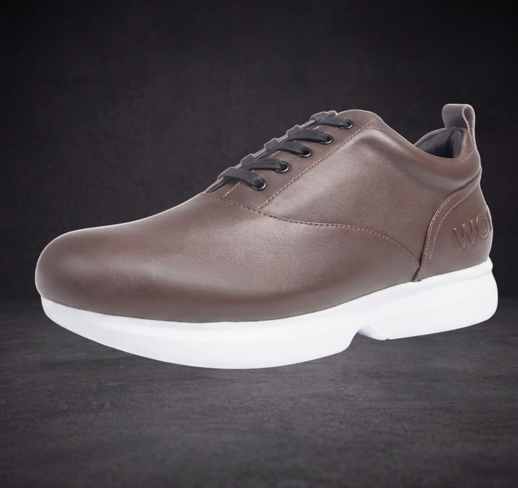 WOA brown low-top sneaker front quarter view with black laces and white platform sole