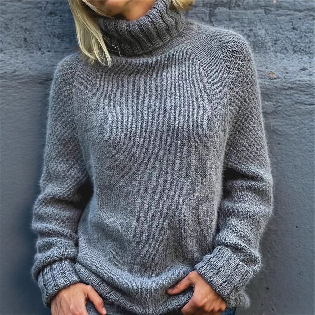 Gray turtleneck knitted sweater with long sleeves and ribbed cuffs and hem