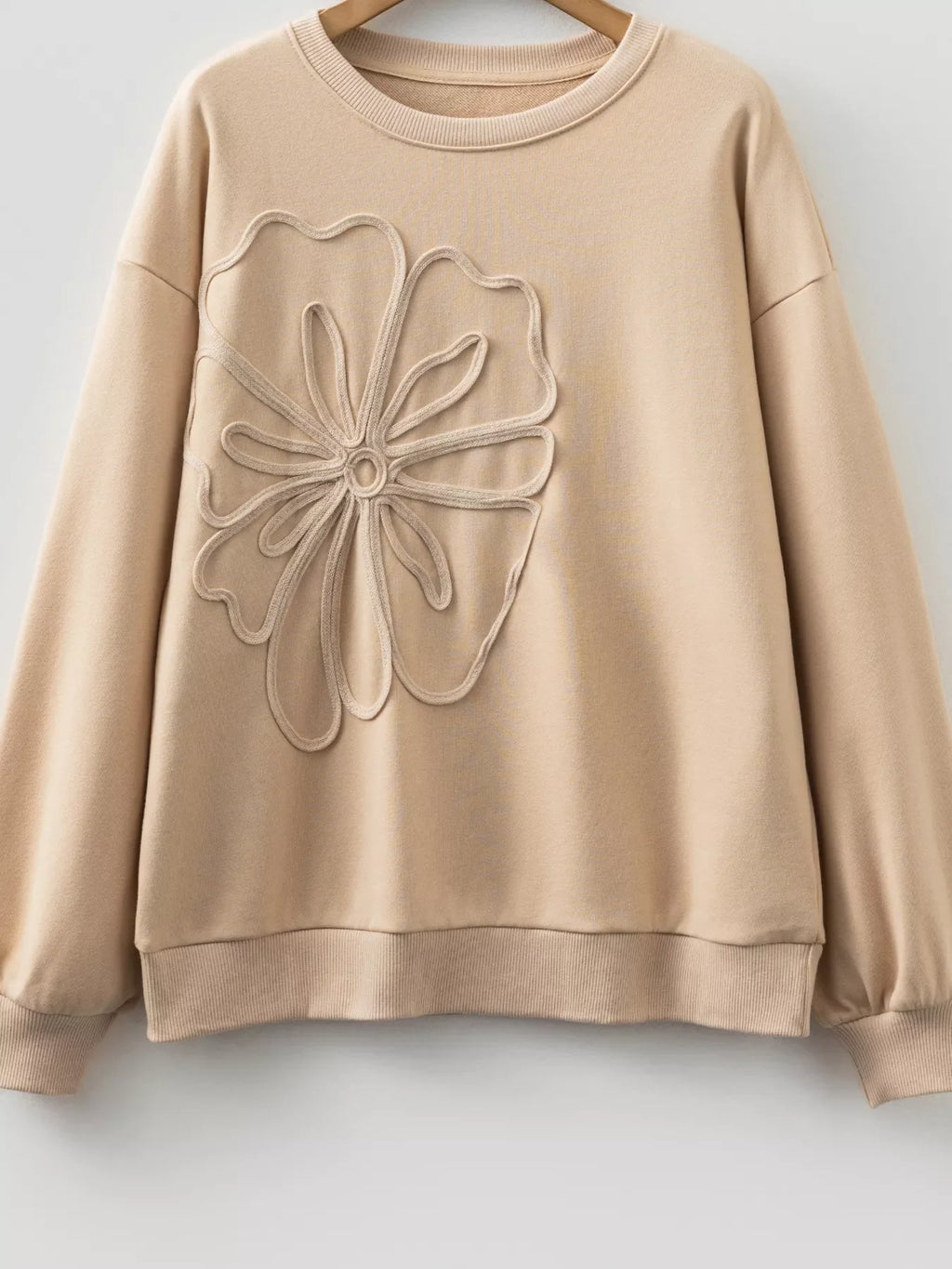 Beige sweatshirt with front embroidered flower motif and crew neckline