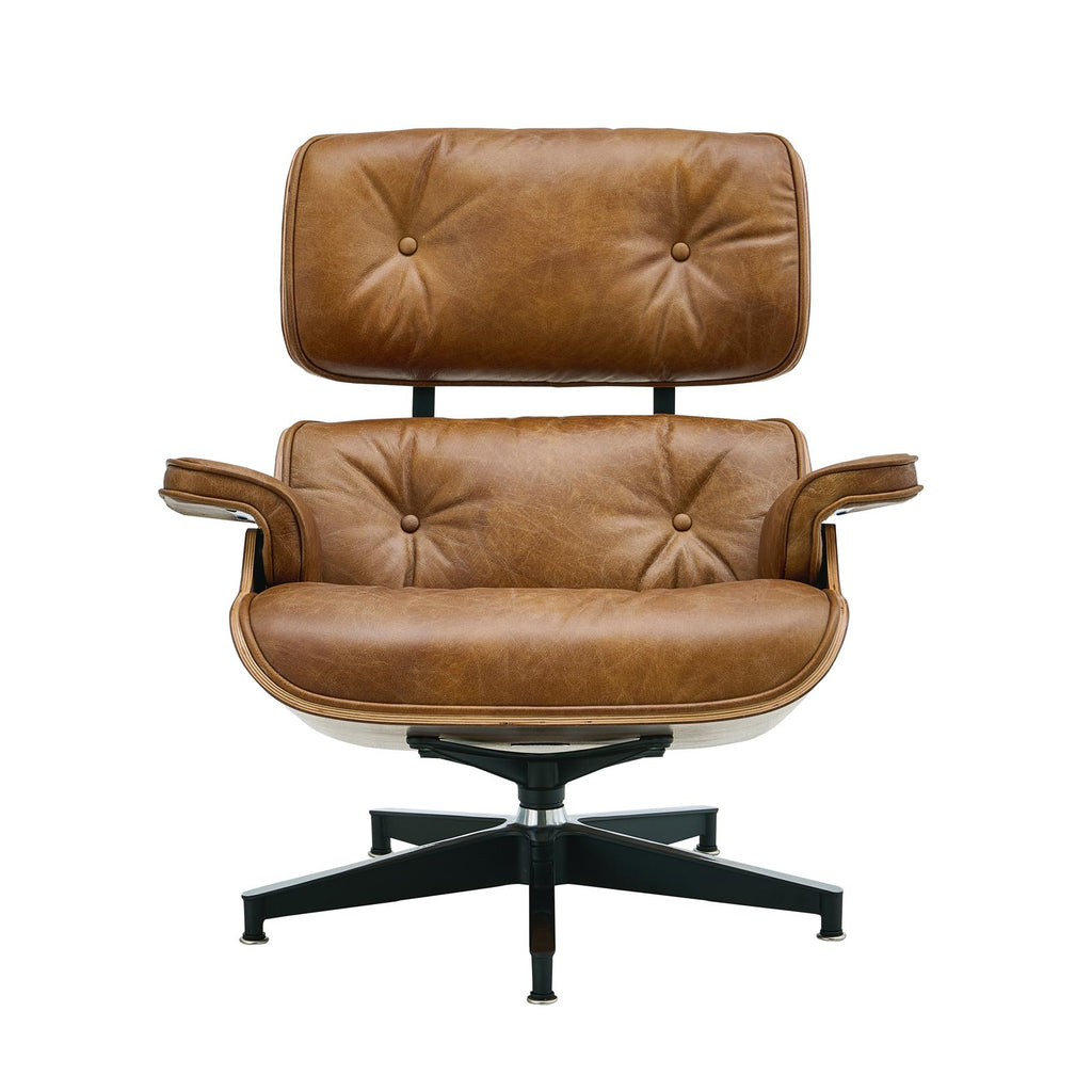 Brown tufted leather office chair with headrest and black cross base
