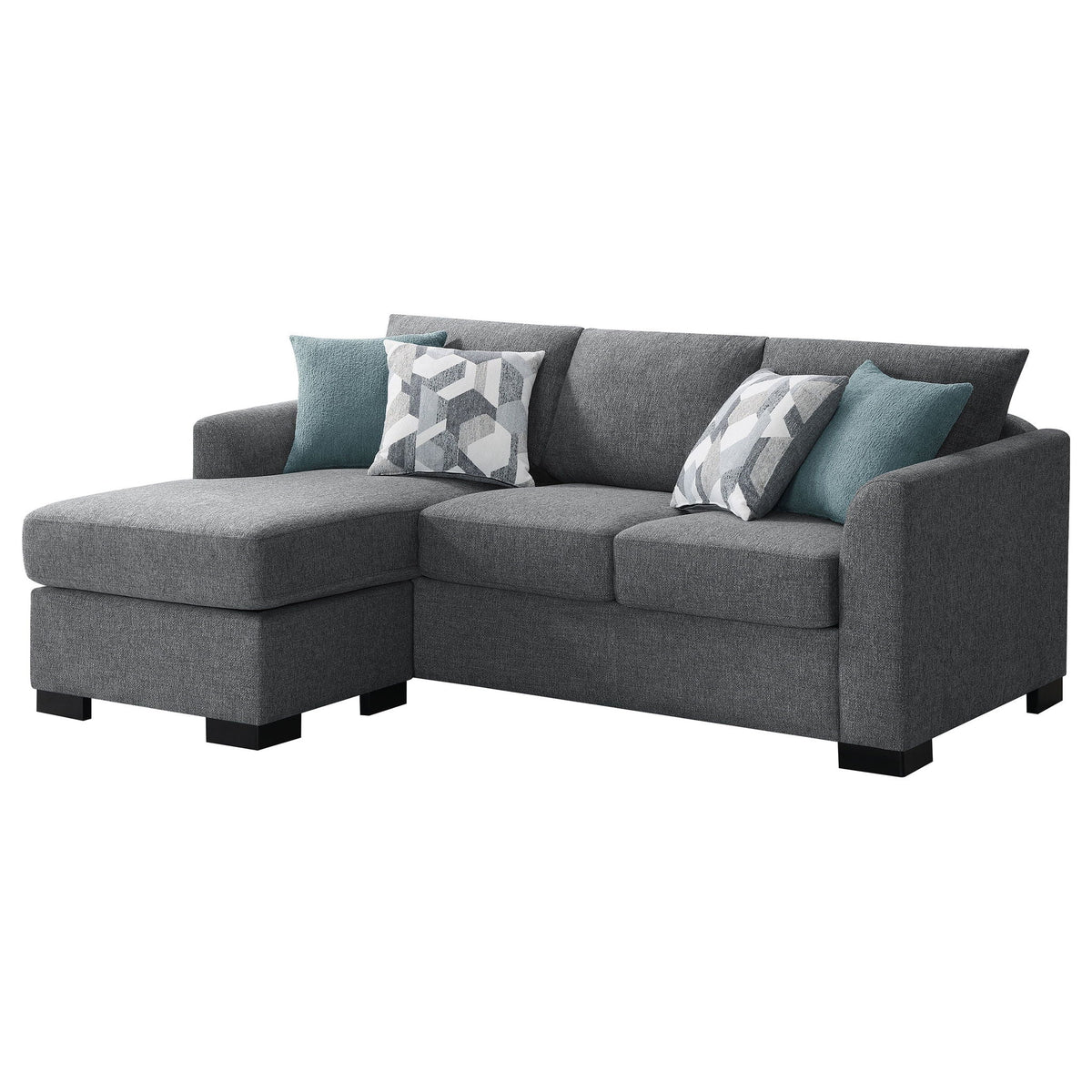 Grey sectional chaise sofa with teal and patterned throw pillows, boxy arms, black legs