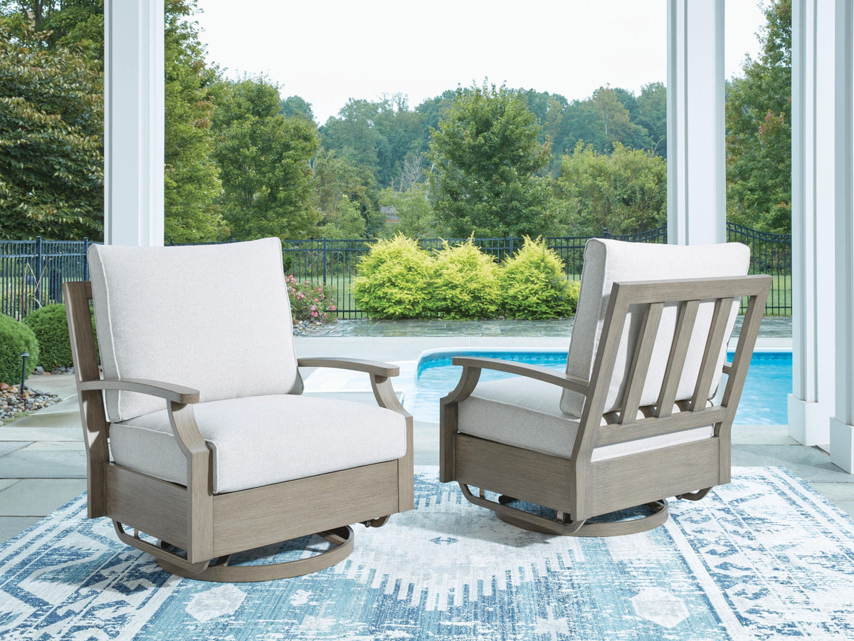 Swivel glider chair with beige cushion and brown frame, with rounded swivel base