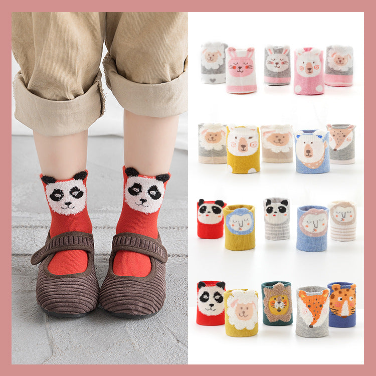 Children’s cartoon tube socks, red panda faces with dark cuffs and brown-gray toes