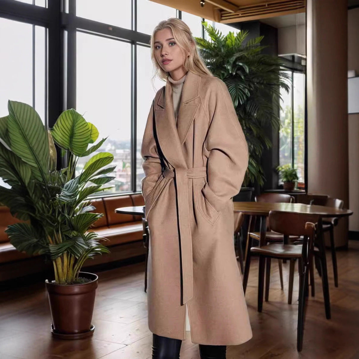 Women\'s tan wool coat with front button closure, sash belt, and side pockets