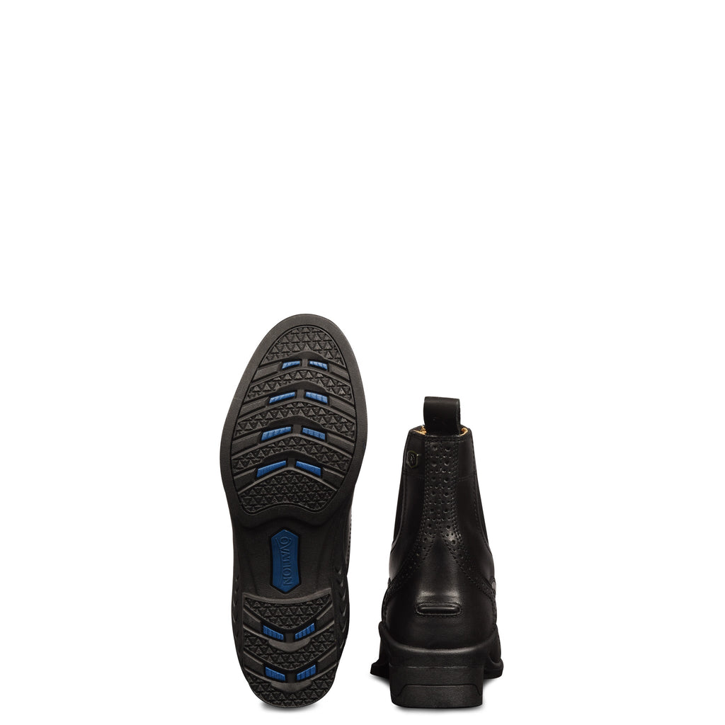 Kids' black ankle boots with blue tread outsole and heel pull tab