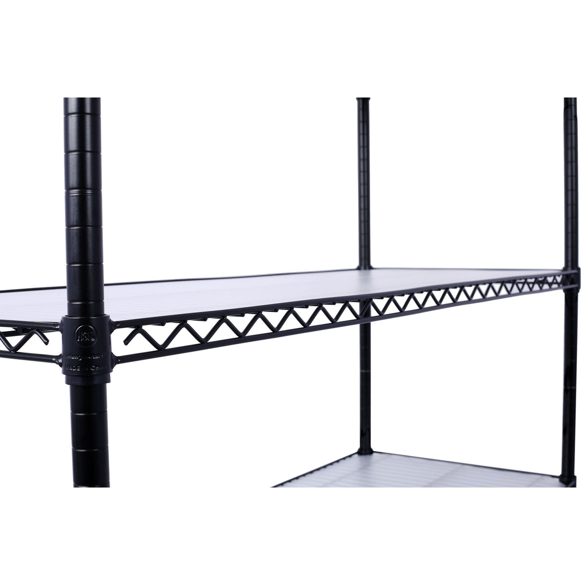 Black wire shelving corner with cross-braced frame and mesh shelf platform