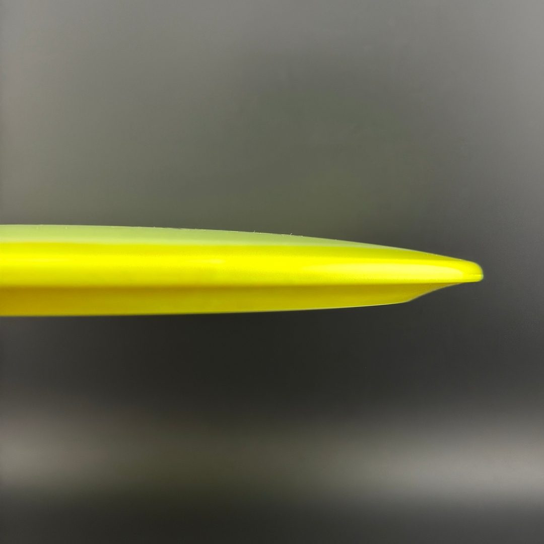 Neon chartreuse disc golf driver side profile