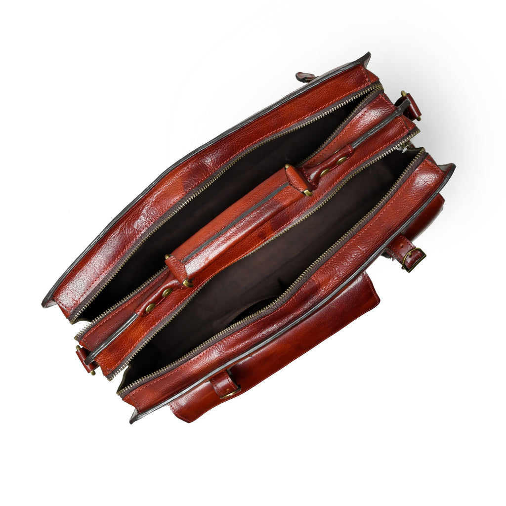 Tan leather briefcase side view with zipper pocket and layered compartments.