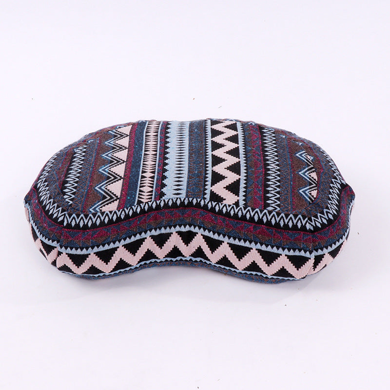 Oval yoga meditation cushion, tribal zigzag pattern in navy, burgundy, white, and blue