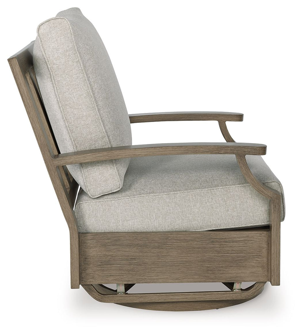Swivel glider chair with beige seat and back cushion, brown wood arms and base
